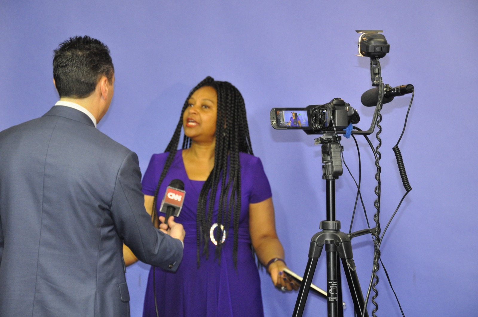 Jess Todtfeld coaching a spokesperson during a media training interview rehearsal