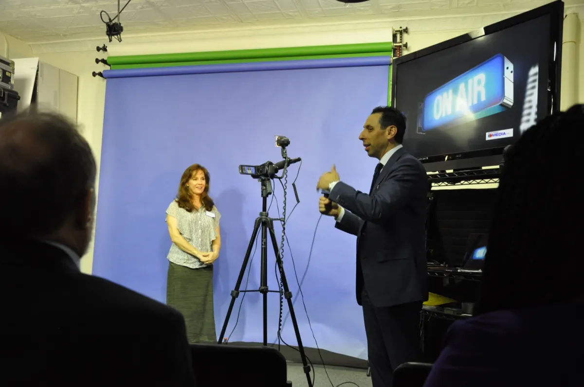 Jess Todtfeld coaching a group of leaders during a live communication training session